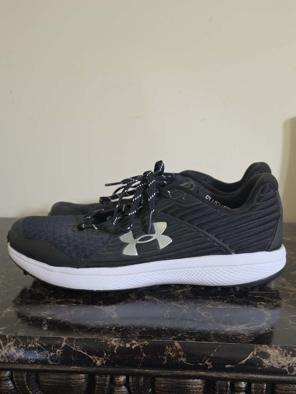 Under Armour Men’s Black Athletic Running Shoes with White Midsoles